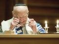 PRICE CHAMBERS / NEWS&GUIDE86-year-old Larry Rieser realizes he needs to wear his glasses as he addresses the congregation during a special Shabbat and Bar Mitzvah of the longtime resident at St. John's Episcopal Church on Friday night. The services are led by Rabbi Mike Comins and Chazzan Judd Grossman.